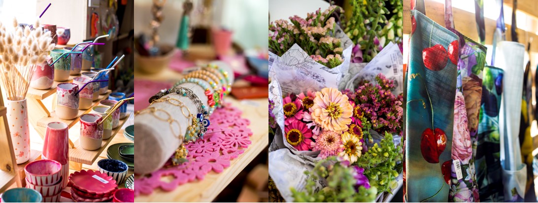 Colourful assorted ceramics, costume jewellery and flowers displayed at the Let's Love Local Gift Market to brighten your day 